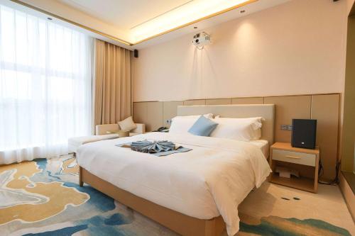 Imagen de la habitación del Hotel Wyndham Garden Rizhao Donggang Resort. Foto 16