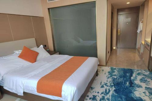 Imagen de la habitación del Hotel Wyndham Garden Rizhao Donggang Resort. Foto 17