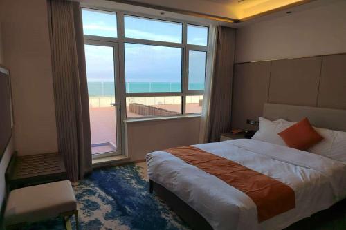 Imagen de la habitación del Hotel Wyndham Garden Rizhao Donggang Resort. Foto 18