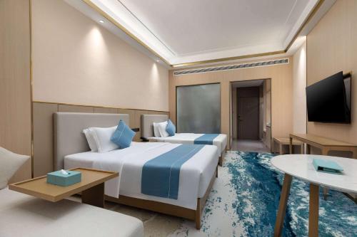 Imagen de la habitación del Hotel Wyndham Garden Rizhao Donggang Resort. Foto 20