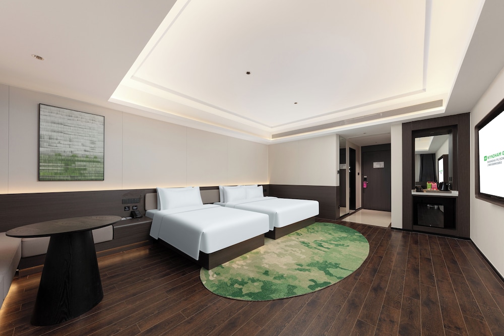 Imagen de la habitación del Hotel Wyndham Garden Shanghai Pudong. Foto 2