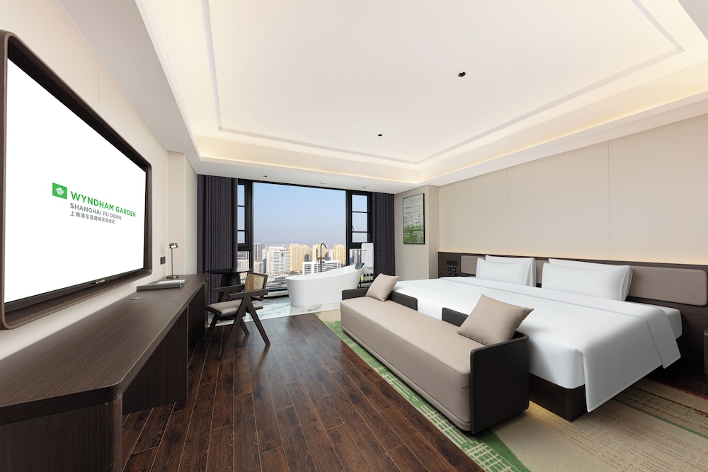 Imagen de la habitación del Hotel Wyndham Garden Shanghai Pudong. Foto 8