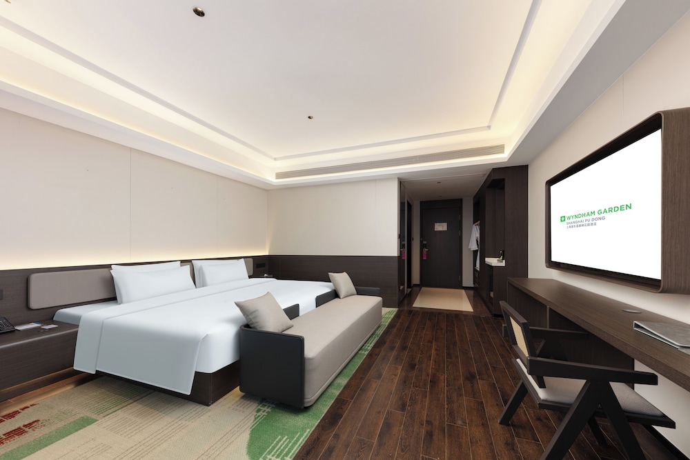 Imagen de la habitación del Hotel Wyndham Garden Shanghai Pudong. Foto 9