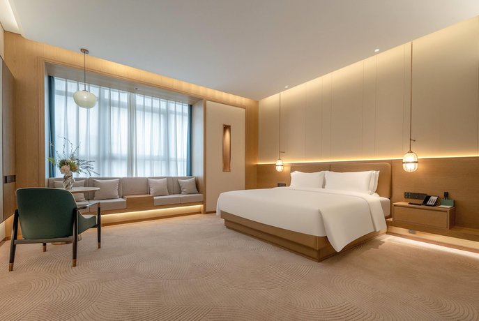 Imagen de la habitación del Hotel Wyndham Garden Shanghai Songjiang. Foto 10