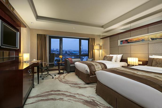 Imagen de la habitación del Hotel Wyndham Garden Suzhou. Foto 4