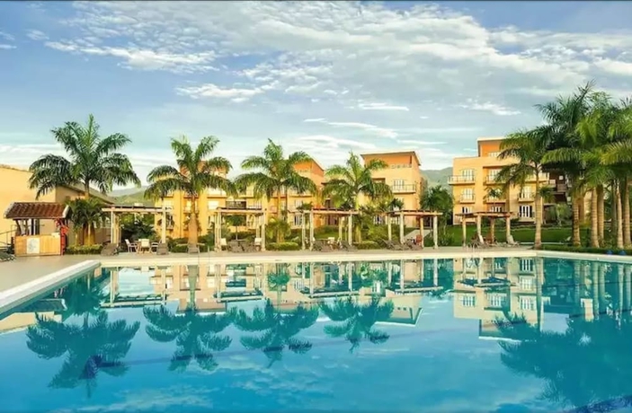 Imagen de la piscina del Hotel Wyndham Garden Villavicencio. Foto 19
