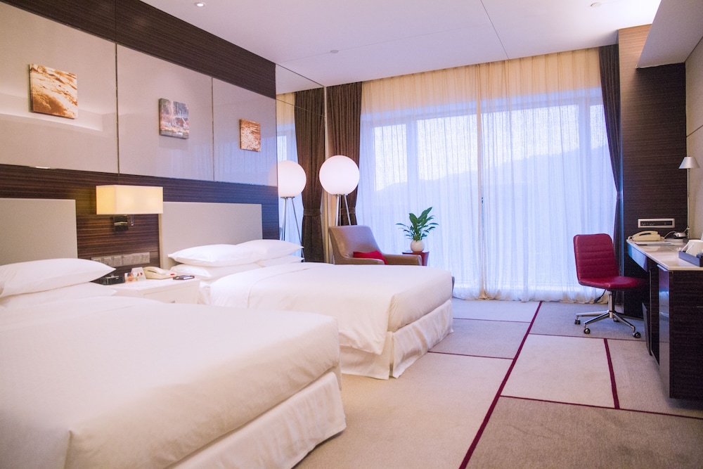 Imagen de la habitación del Hotel Wyndham Garden Yuhuan Downtown. Foto 9