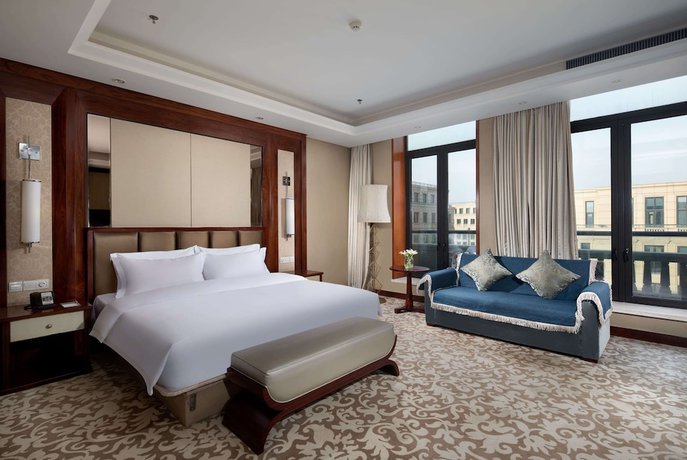 Imagen de la habitación del Hotel Wyndham Garden Zhengzhou East. Foto 8