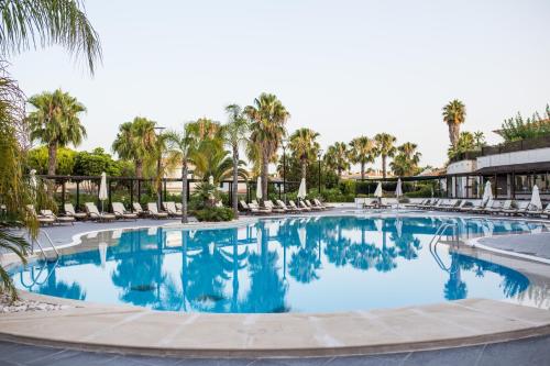 Imagen de la piscina del Hotel Wyndham Grand Algarve. Foto 19
