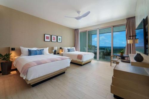 Imagen de la habitación del Hotel Wyndham Grand Barbados Sam Lords Castle All Inclusive Resort. Foto 6