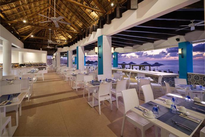Imagen del bar/restaurante del Hotel Wyndham Grand Cancun All Inclusive Resort and Villas. Foto 4