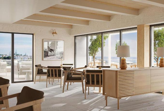 Imagen del bar/restaurante del Hotel Wyndham Grand Carvoeiro Algarve. Foto 3