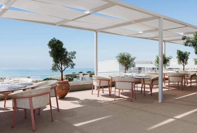 Imagen del bar/restaurante del Hotel Wyndham Grand Carvoeiro Algarve. Foto 4