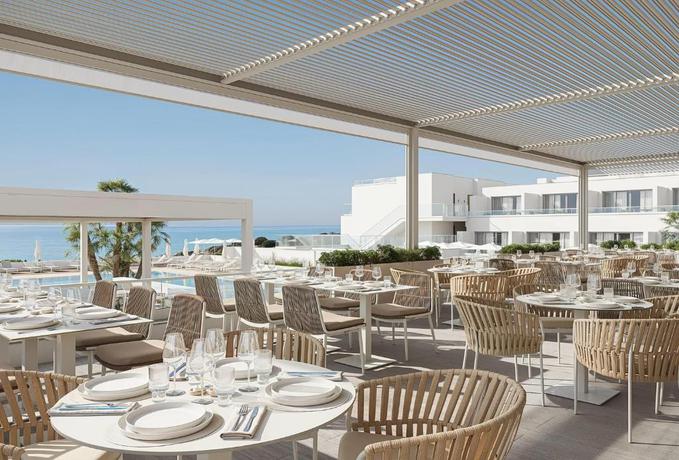 Imagen del bar/restaurante del Hotel Wyndham Grand Carvoeiro Algarve. Foto 7