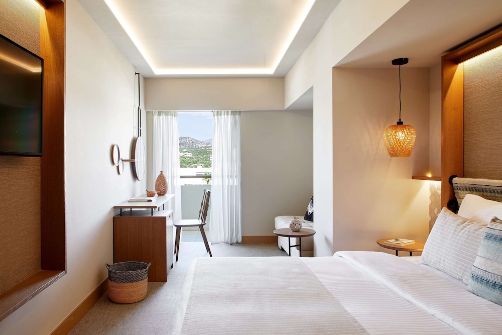 Imagen de la habitación del Hotel Wyndham Grand Crete Mirabello Bay. Foto 6