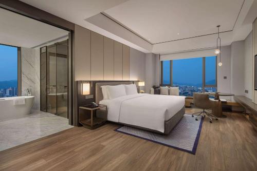 Imagen de la habitación del Hotel Wyndham Grand Lishui Downtown. Foto 4