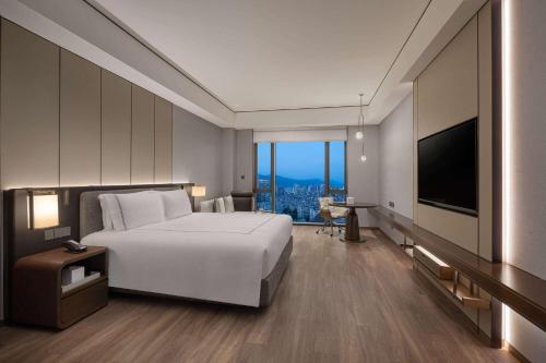 Imagen de la habitación del Hotel Wyndham Grand Lishui Downtown. Foto 5
