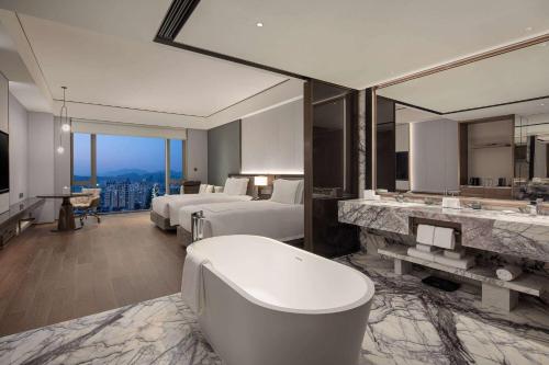 Imagen de la habitación del Hotel Wyndham Grand Lishui Downtown. Foto 7