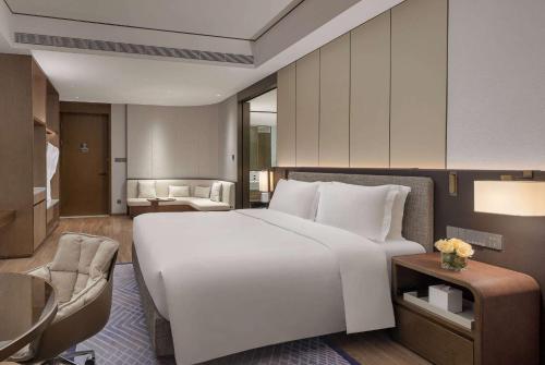 Imagen de la habitación del Hotel Wyndham Grand Lishui Downtown. Foto 8