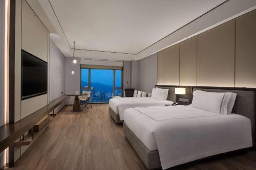 Imagen de la habitación del Hotel Wyndham Grand Lishui Downtown. Foto 11