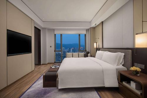 Imagen de la habitación del Hotel Wyndham Grand Lishui Downtown. Foto 13