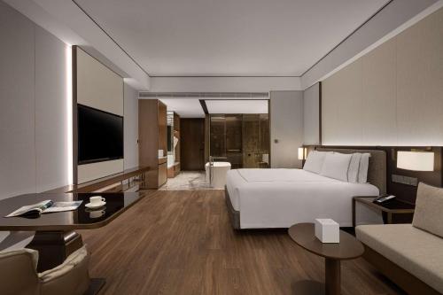 Imagen de la habitación del Hotel Wyndham Grand Lishui Downtown. Foto 18