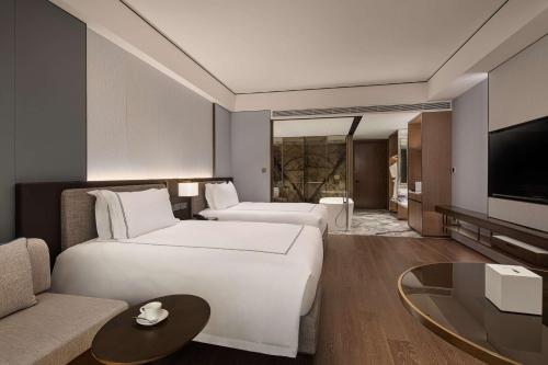 Imagen de la habitación del Hotel Wyndham Grand Lishui Downtown. Foto 19
