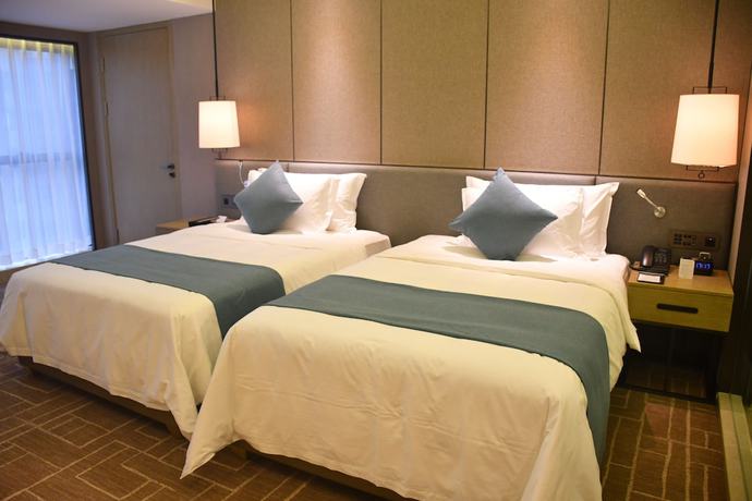 Imagen de la habitación del Hotel Wyndham Grand Maoming. Foto 4