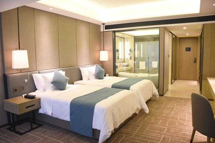 Imagen de la habitación del Hotel Wyndham Grand Maoming. Foto 5