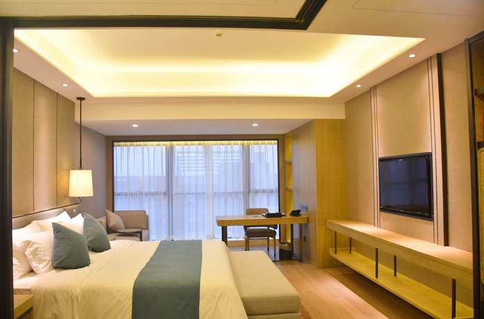 Imagen de la habitación del Hotel Wyndham Grand Maoming. Foto 6