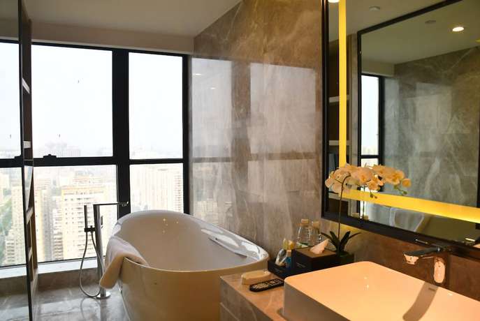 Imagen de la habitación del Hotel Wyndham Grand Maoming. Foto 7