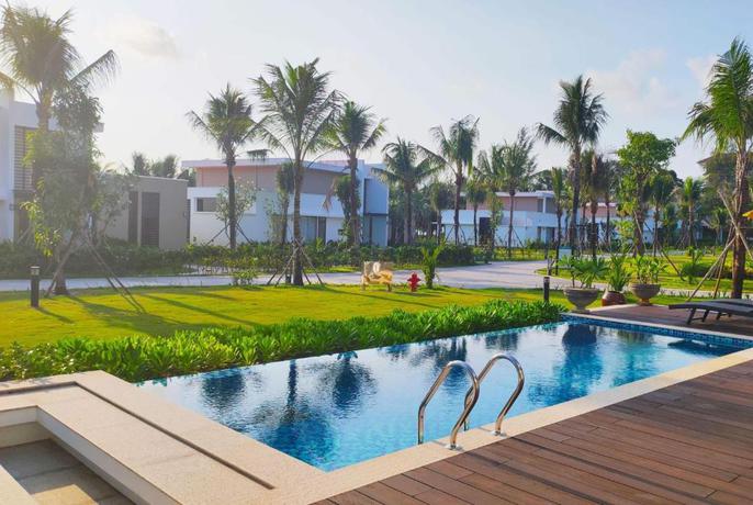 Imagen de la piscina del Hotel Wyndham Grand Phu Quoc. Foto 34