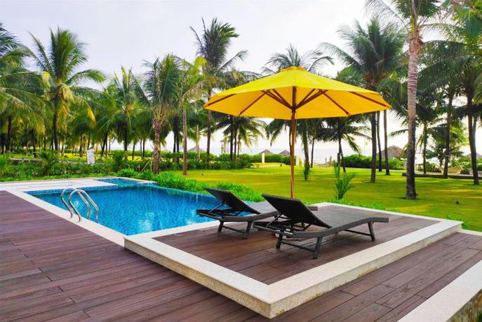 Imagen de la piscina del Hotel Wyndham Grand Phu Quoc. Foto 38