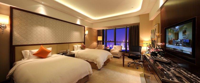 Imagen de la habitación del Hotel Wyndham Grand Plaza Royale Changsheng Jiangyin. Foto 12