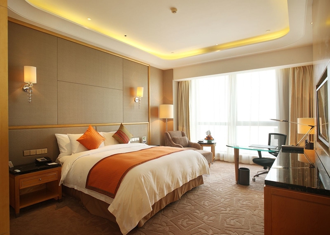 Imagen de la habitación del Hotel Wyndham Grand Plaza Royale Changsheng Jiangyin. Foto 13