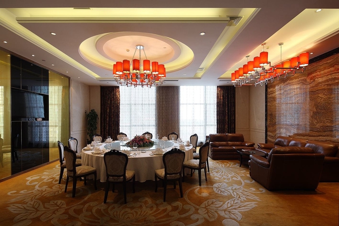 Imagen del bar/restaurante del Hotel Wyndham Grand Plaza Royale Changsheng Jiangyin. Foto 8
