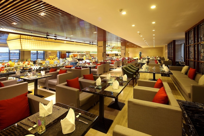 Imagen del bar/restaurante del Hotel Wyndham Grand Plaza Royale Changsheng Jiangyin. Foto 11