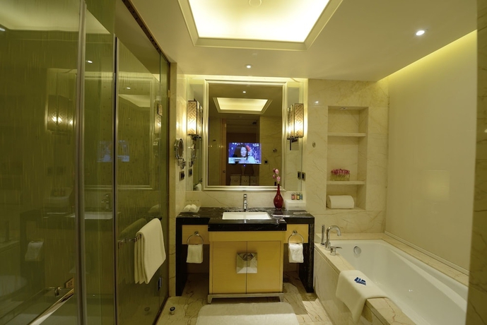 Imagen de la habitación del Hotel Wyndham Grand Plaza Royale Colorful Yunnan Kunming. Foto 9