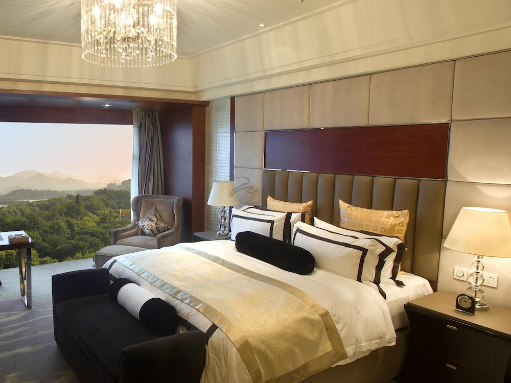Imagen de la habitación del Hotel Wyndham Grand Plaza Royale Hangzhou. Foto 12