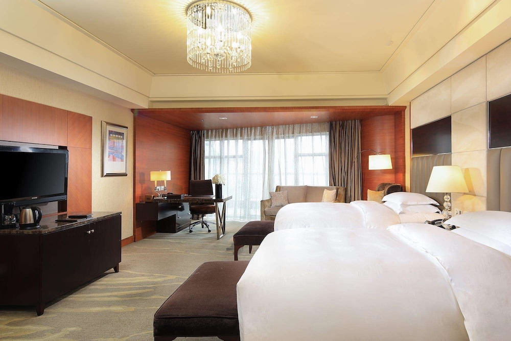 Imagen de la habitación del Hotel Wyndham Grand Plaza Royale Hangzhou. Foto 15