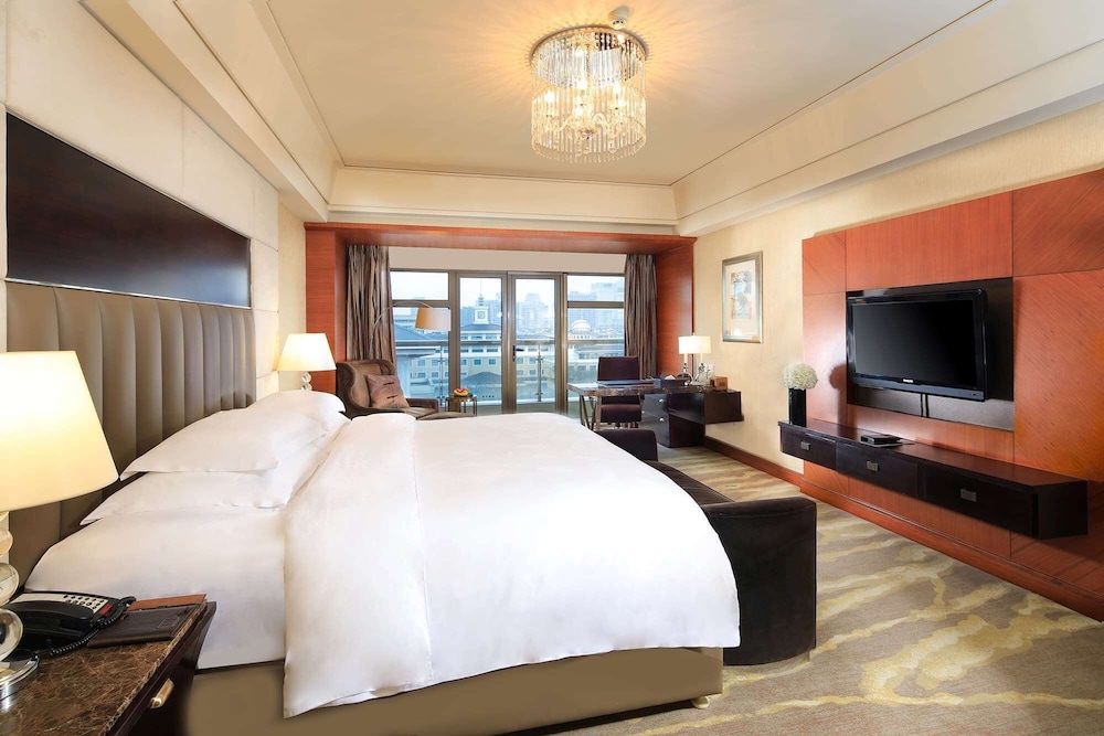 Imagen de la habitación del Hotel Wyndham Grand Plaza Royale Hangzhou. Foto 16