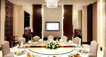 Imagen del bar/restaurante del Hotel Wyndham Grand Plaza Royale Mingfa Zhangzhou. Foto 11