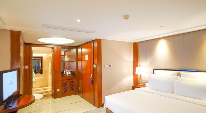 Imagen de la habitación del Hotel Wyndham Grand Plaza Royale Ningbo. Foto 9
