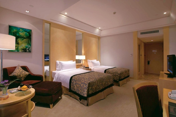 Imagen de la habitación del Hotel Wyndham Grand Plaza Royale Ningbo. Foto 13