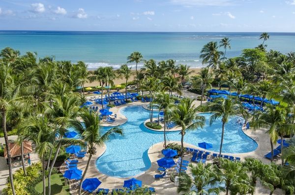 Imagen de la piscina del Hotel Wyndham Grand Rio Mar Rainforest Beach and Golf Resort. Foto 8