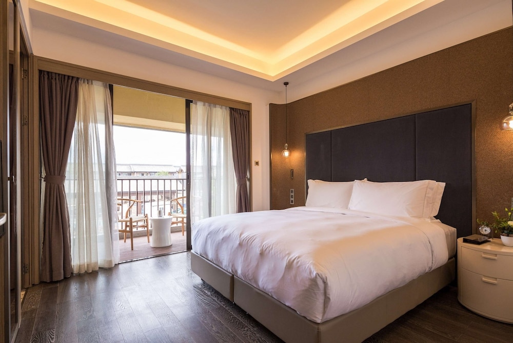Imagen de la habitación del Hotel Wyndham Grand Royal Hotel Jinlin Lijiang. Foto 4