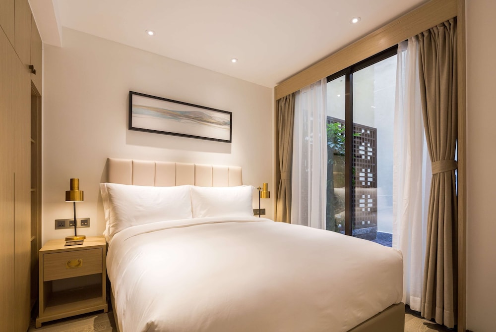 Imagen de la habitación del Hotel Wyndham Grand Royal Hotel Jinlin Lijiang. Foto 8