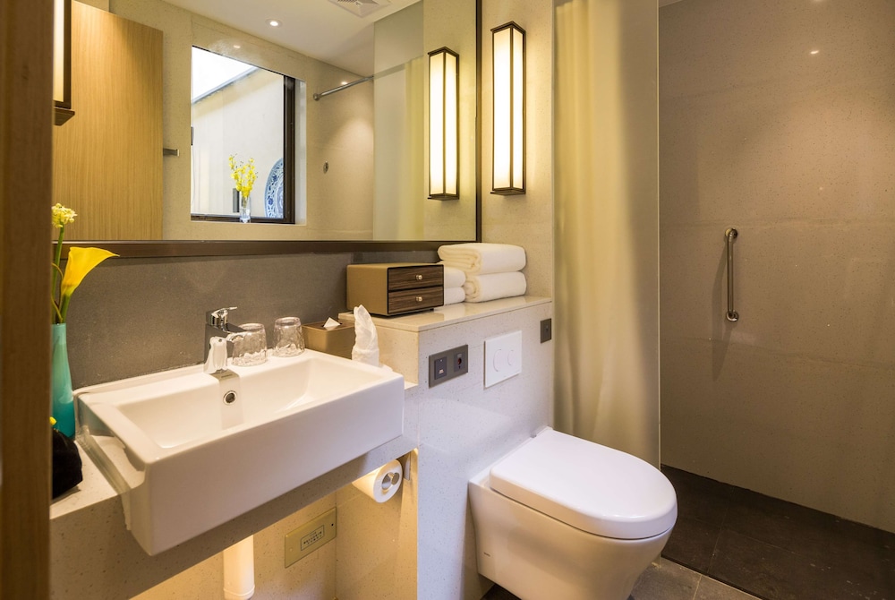 Imagen de la habitación del Hotel Wyndham Grand Royal Hotel Jinlin Lijiang. Foto 17