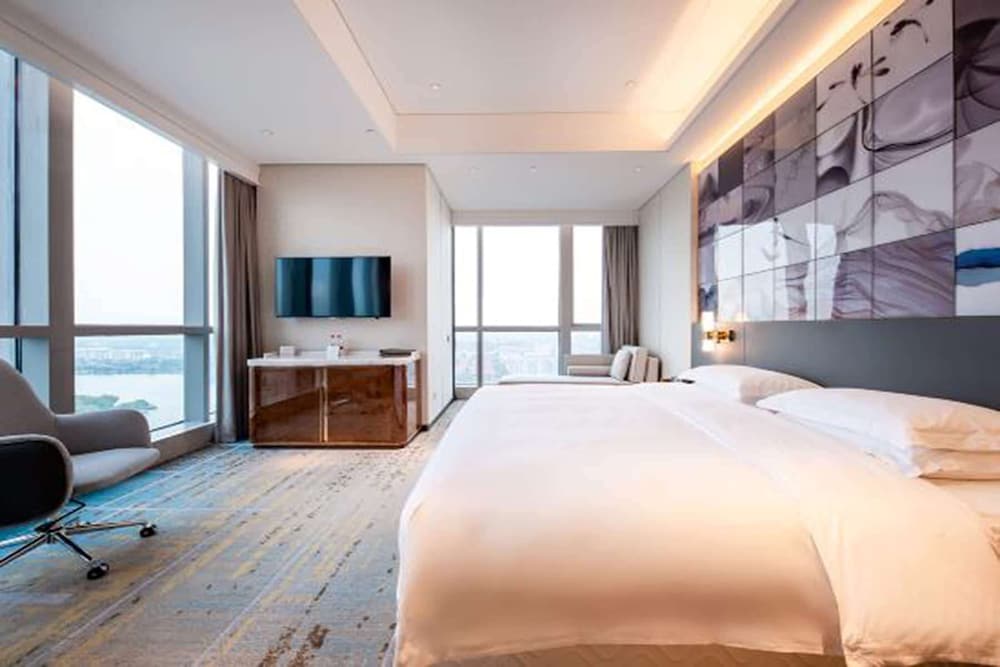 Imagen de la habitación del Hotel Wyndham Grand Suzhou Fenhu. Foto 3