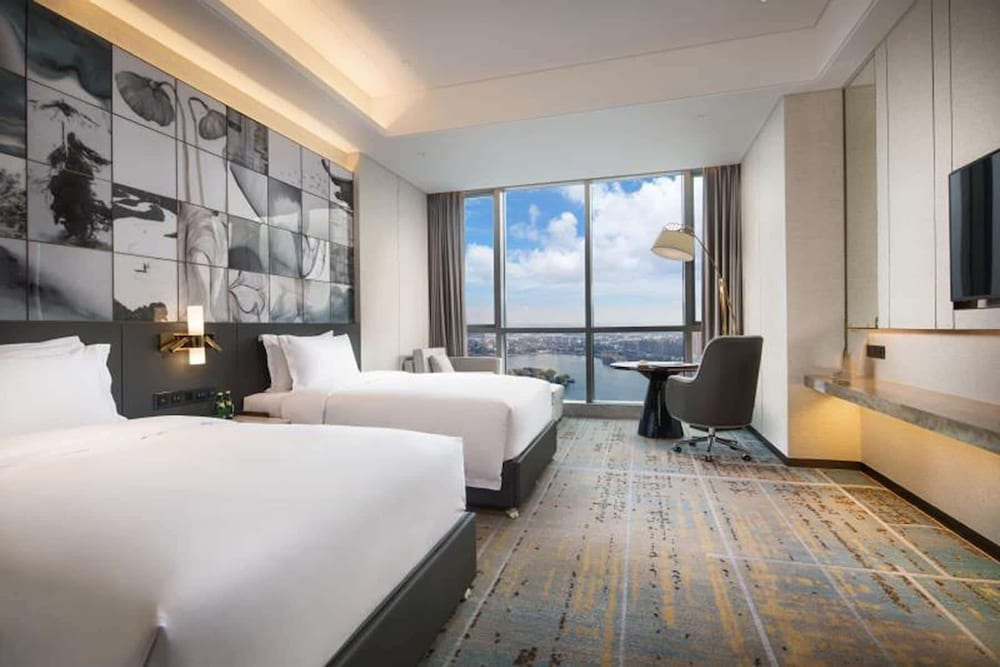 Imagen de la habitación del Hotel Wyndham Grand Suzhou Fenhu. Foto 5